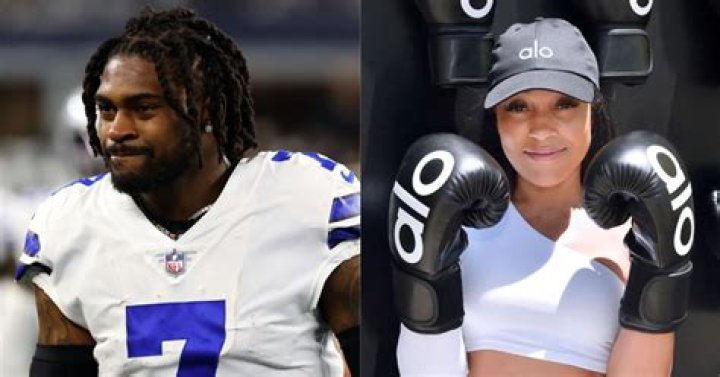 Trevon Diggs & Joie Chavis Smooch On The Sidelines |